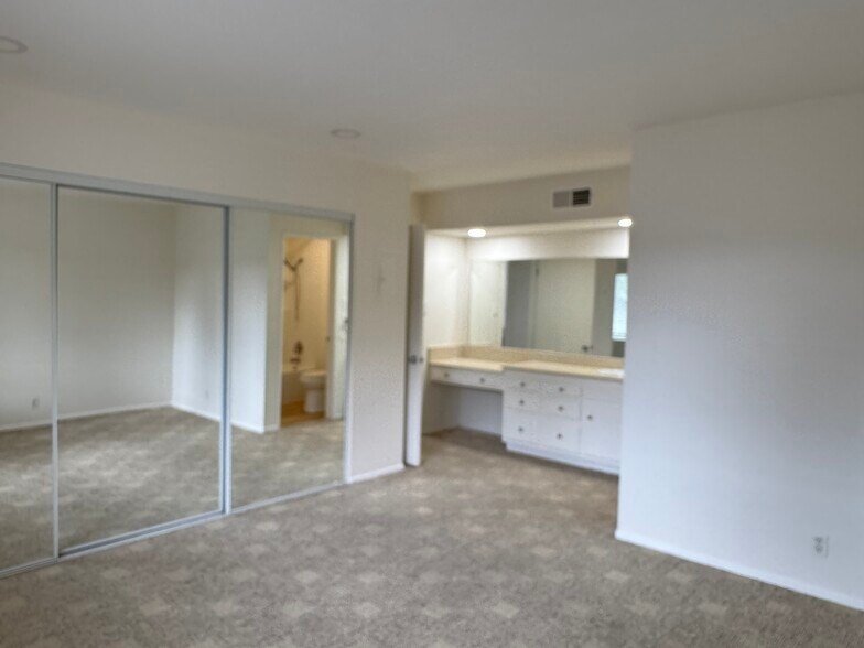 View from bedroom to dressing mirror and sink - 400 N Acacia Ave