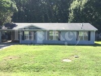 Building Photo - 117 Whispering Pine Ln NE