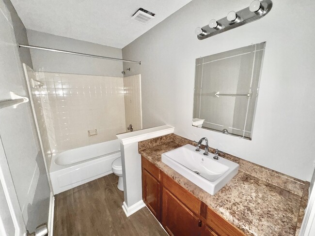 Building Photo - 8415 Woolrich Dr