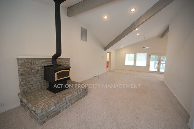 Building Photo - 3 bed 2.5 bath home in a private country setting, close to town. All new luxury vinyl plank floor...