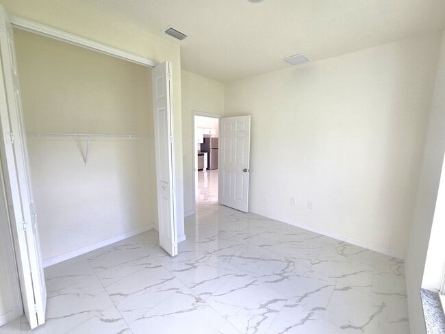 Building Photo - Great location in Lehigh Acres-Three Bedro...