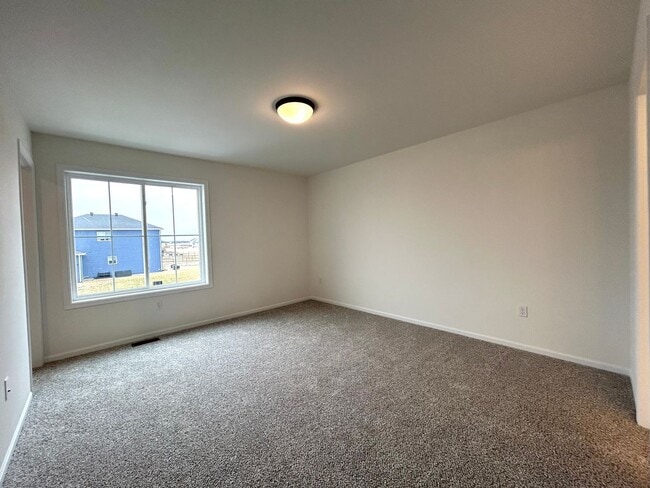 Building Photo - Spacious & Stylish 3-Bed Home with Modern Finishes and Attached 2-Stall Garage