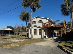 Building Photo - "Charming 2-Bedroom Duplex Oasis on Christmas Tree Lane – Your Perfect Panama City Beach Retreat!"