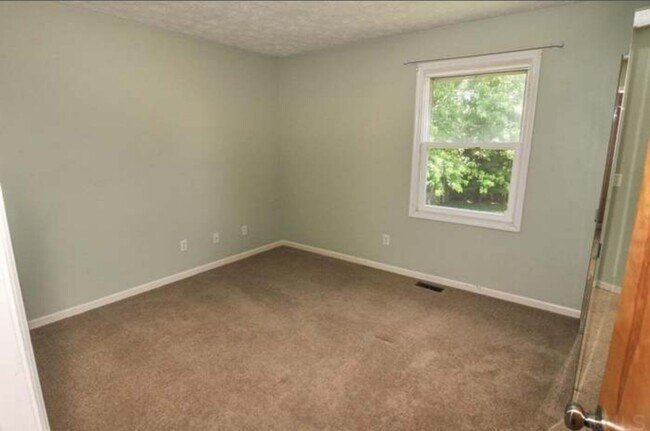 Building Photo - Beautiful 4-Bedroom Home on Spacious Corne...