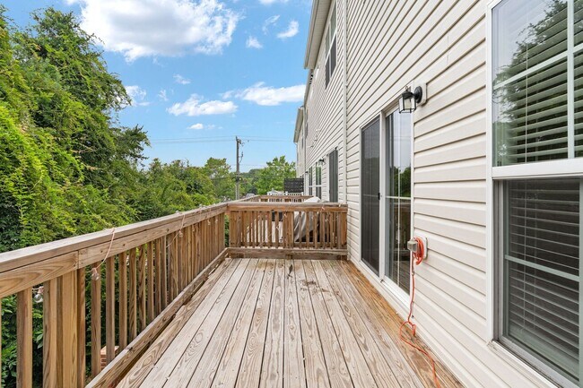 Building Photo - Your Next Home: Modern 3-Level Townhome with Garage, Deck & Huge Flex Space