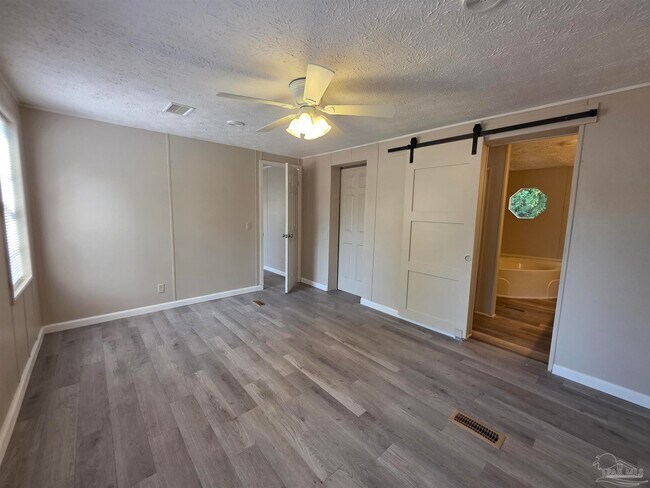 Building Photo - 8906 Figland Ave