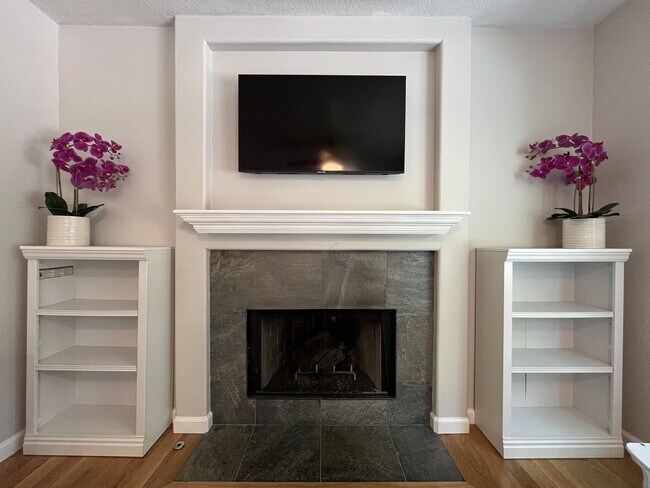 Building Photo - Spacious 3-Bedroom Home with Two Living Areas, Private Balcony, Fireplace & Attached 2-Car Garage
