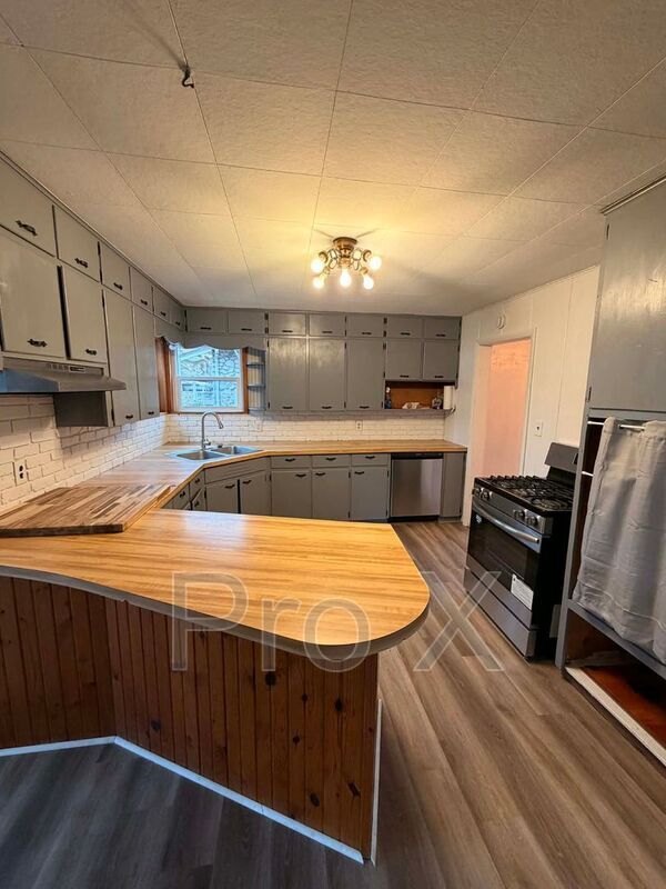 Building Photo - 1727 S Empire Ave