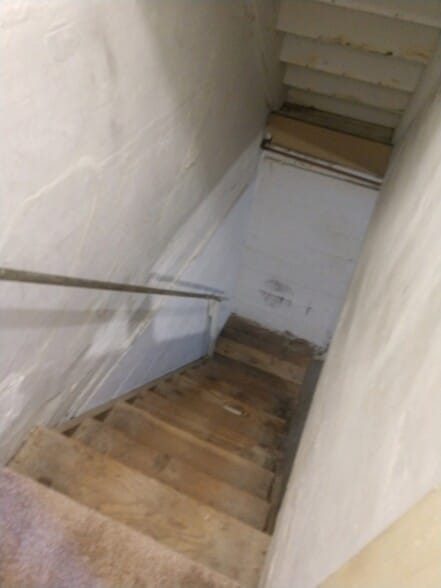 Stairs leading down to basement - 19 Pond Hill Rd