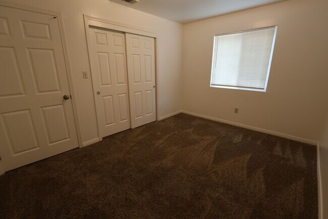 Building Photo - Spacious 3-Bedroom Duplex with Private Patio and Prime Location