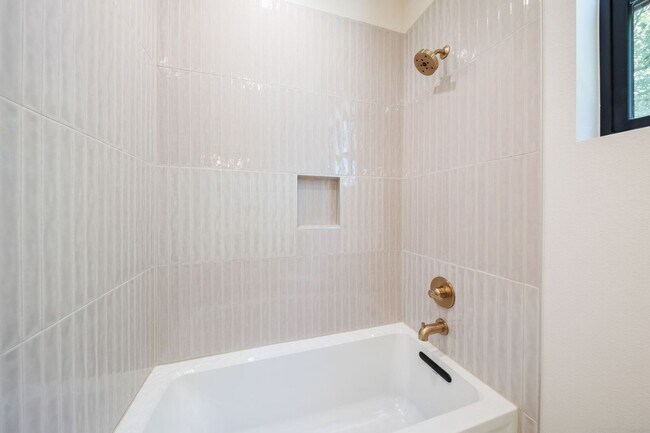 Building Photo - Luxury Redefined: Experience Vibrant Living in this 3-Bedroom Haven in East Austin