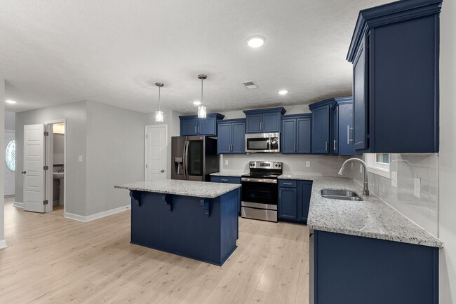 Building Photo - Pet Friendly Four Bedroom!