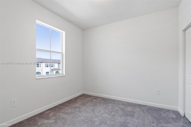 Building Photo - 3 br, 2.5 bath Townhome - 12725 NW 24th Ave