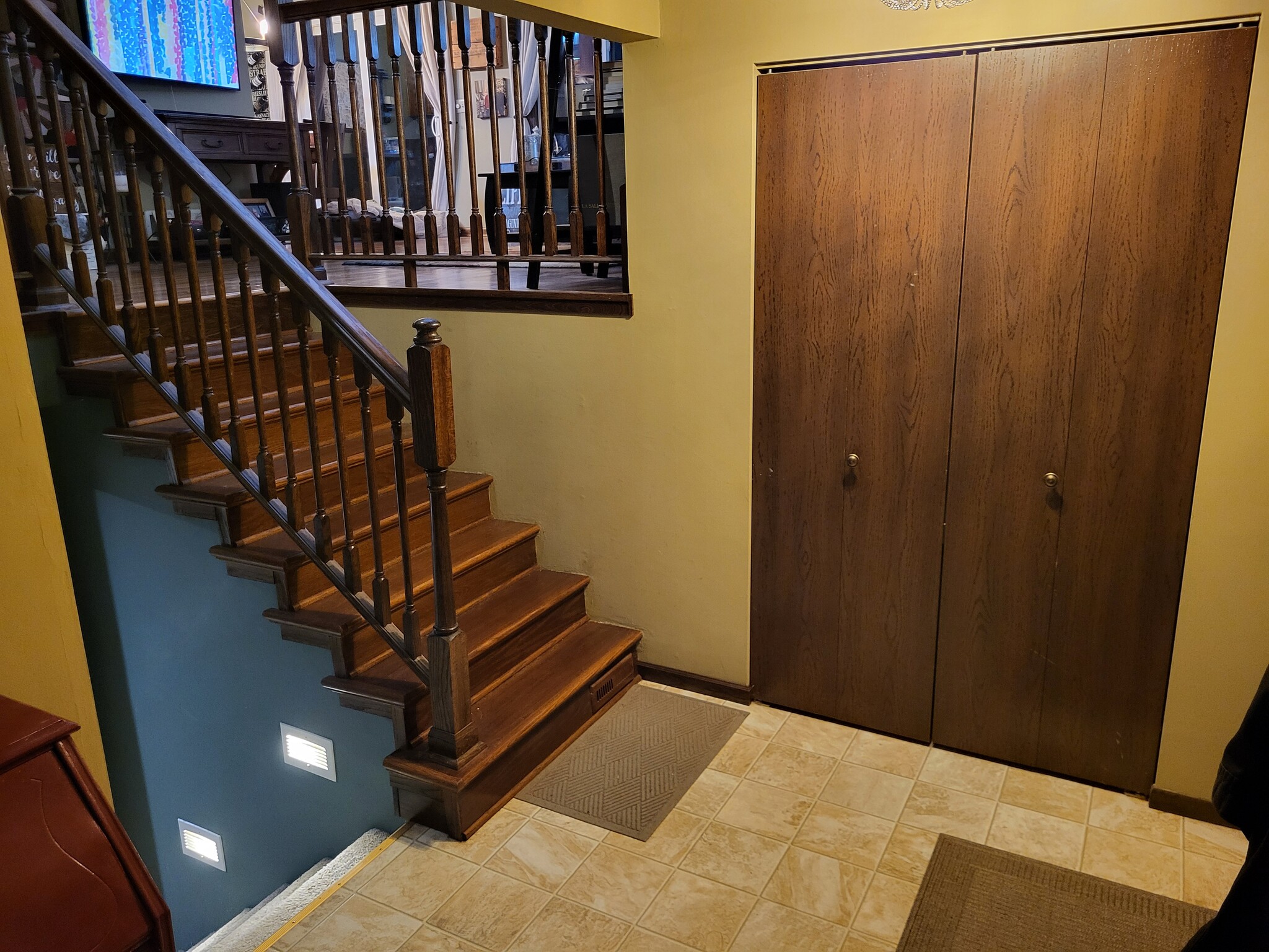Stair to Upper level - carpet runner will be installed before move in - 8460 Red Oak Dr