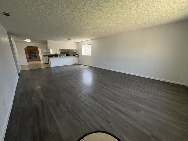 Building Photo - Large Living Area, rear yard has RV Access!