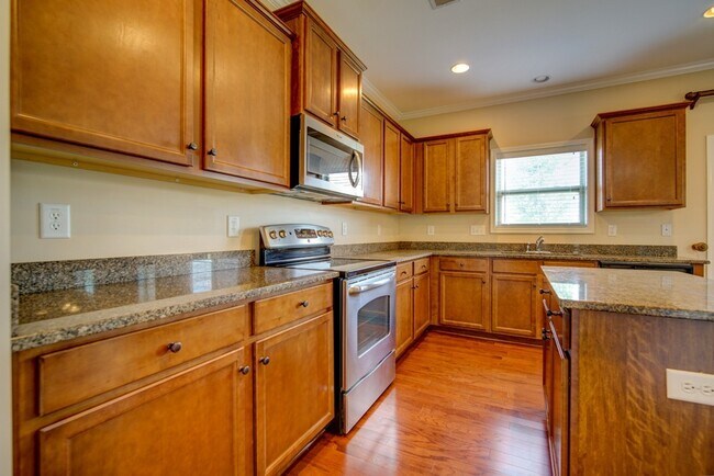 Building Photo - Gorgeous 4/5 BR, 3 BA, 2 Car Garage Home with Fenced Backyard and Large Storage Unit