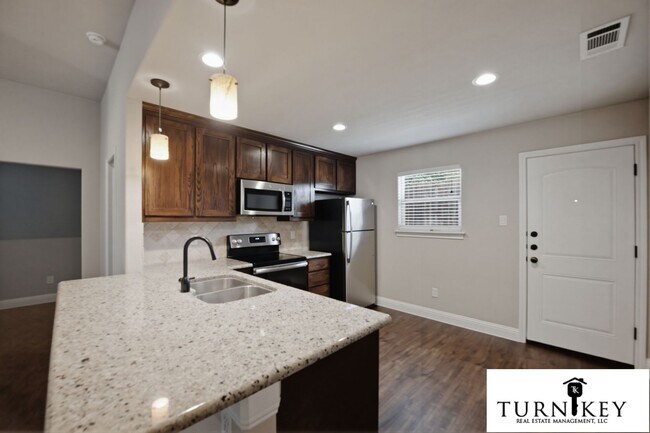 Building Photo - 1325-1329 White Sand Dr.