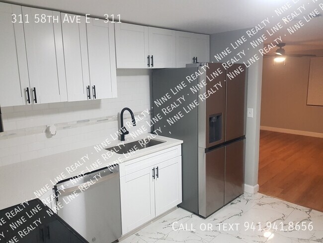 Building Photo - 311 58th Ave E