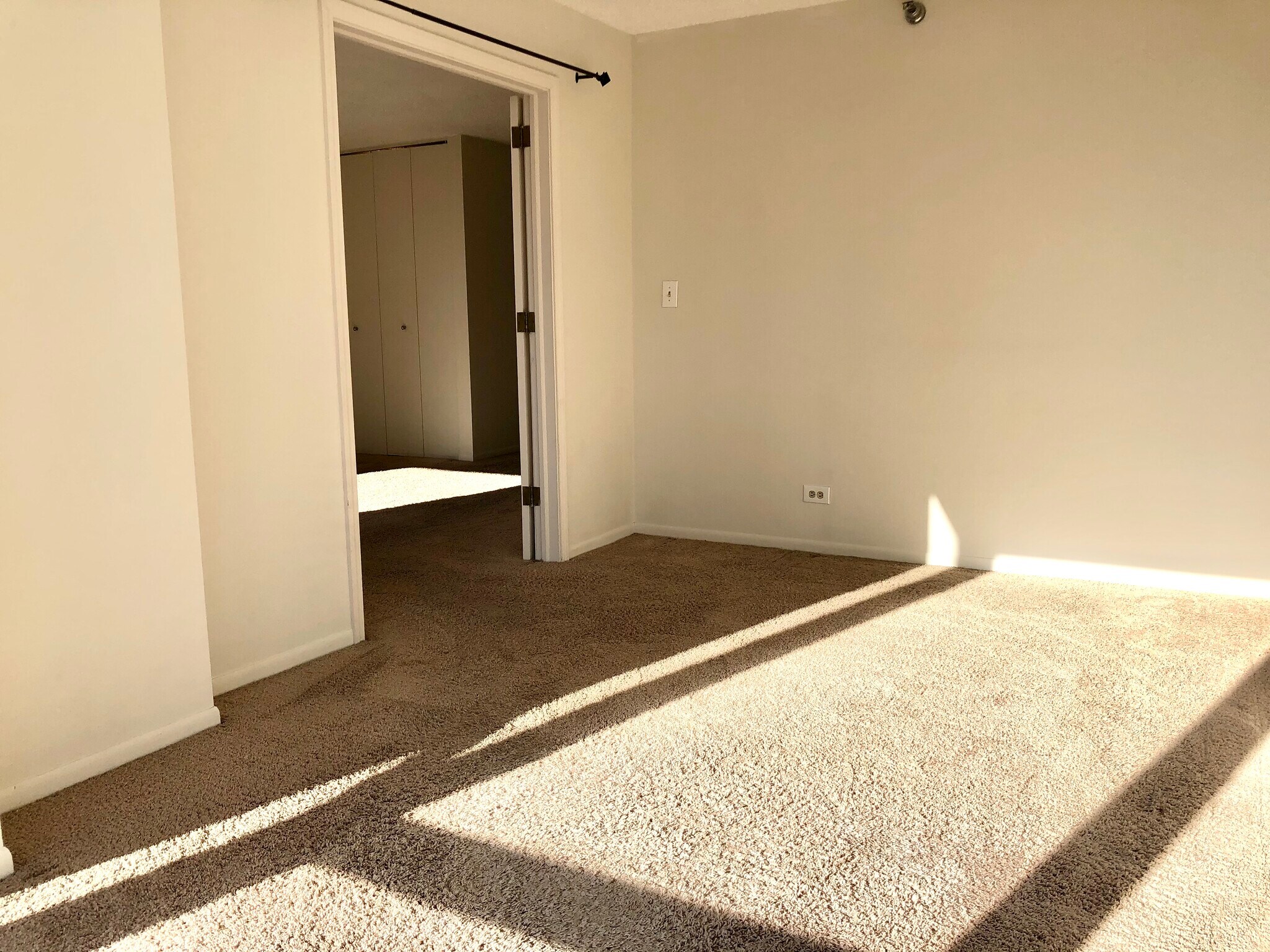 View from bedroom into living room / dining room - 1122 N Clark St