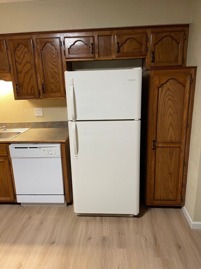 Dishwasher and Fridge - 217 SW Pinetree Ln