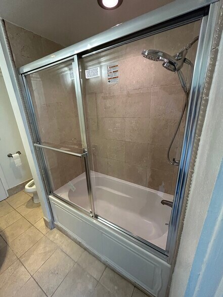 Bathroom with a brand sliding door Installed - 2300 Sunset Heights Dr
