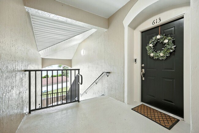 Building Photo - Bright Top-Floor Condo in Resort-Style Gated Community