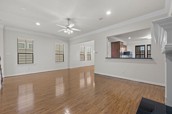 Building Photo - Luxury Townhome with Attached Garage & Outdoor Entertaining Area - $100 off first and second mont!