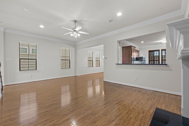 Building Photo - Stylish 3-Story Townhome with Covered Outd...