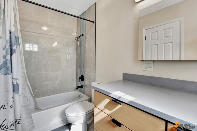 Building Photo - Spacious and bright condo located in a quiet area that boasts the perfect combination of style an...