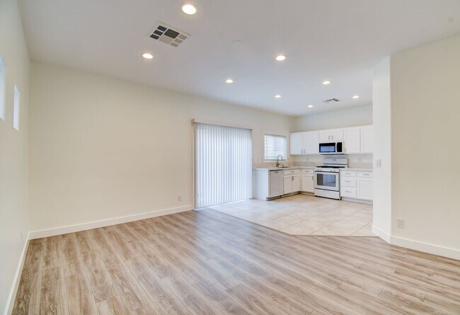 Building Photo - Great home with 4 bedrooms, 2.5 baths. New Floors Paint and Countertops.