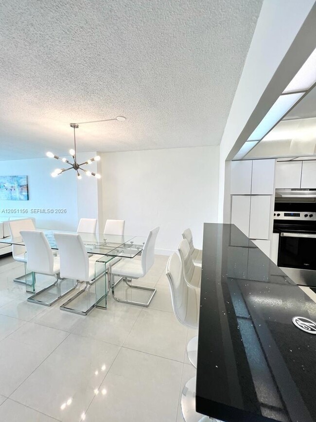 Building Photo - 19370 Collins Ave
