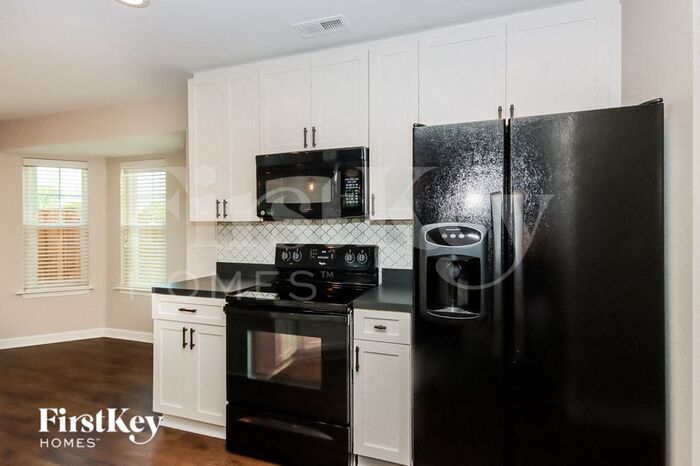 Building Photo - 8125 Rolling Meadows Ln