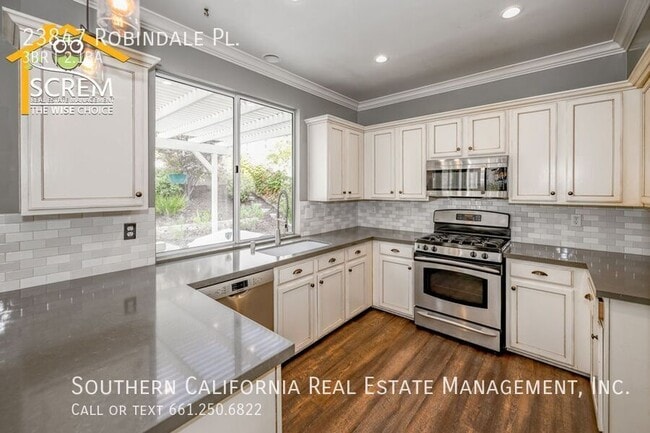 Building Photo - 23847 Robindale Pl