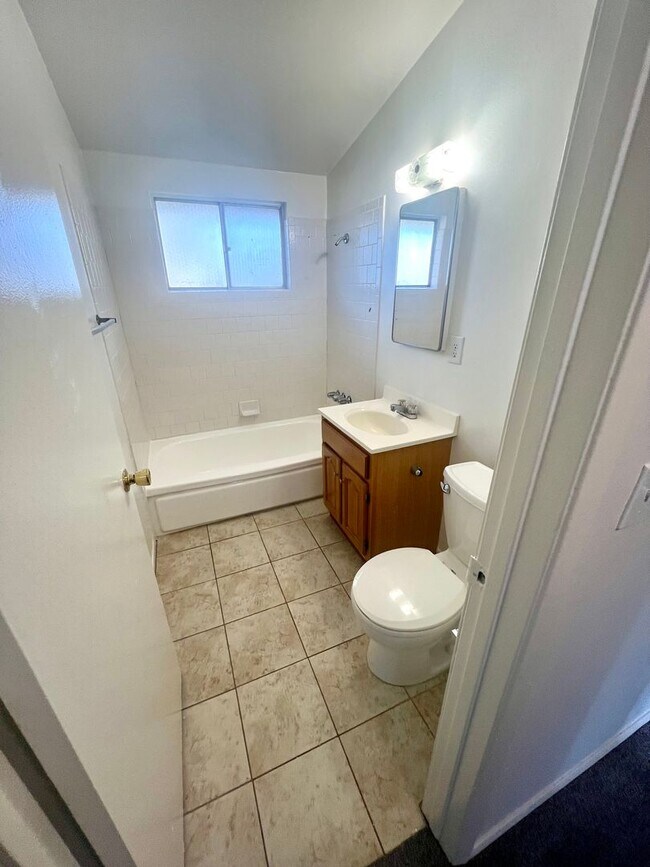 Building Photo - Spacious Two Bedroom with New Carpet - Available Now!