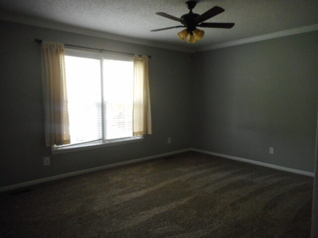 Master bedroom on the main floor. - 3517 Barron Way