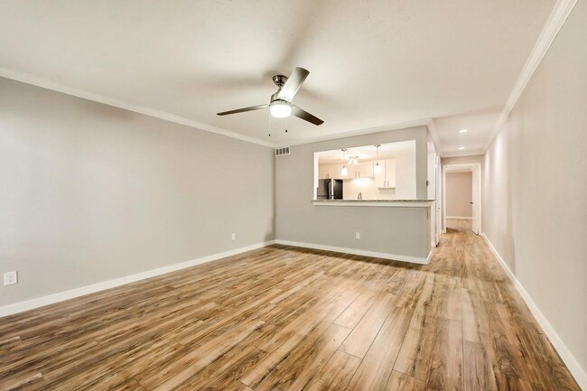 Living Area with Kitchen View - 3827 Gilbert Ave