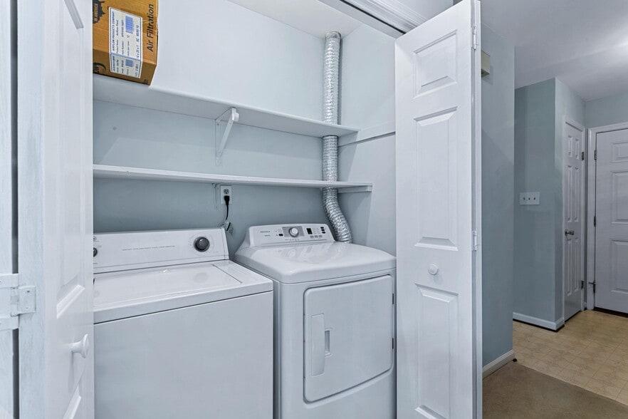 Laundry Area with Washer and Dryer - 117 Wellesley Dr