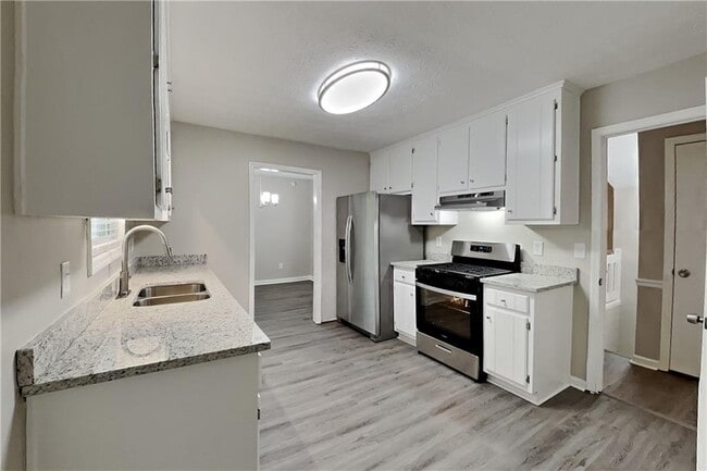 Building Photo - 4171 Woodcrest Dr