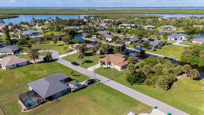 Building Photo - 3 BEDROOM • 2 BATHROOM • PRIVATE POOL • WATERFRONT • BOAT LIFT • ZERO DEPOSIT MOVE-IN AVAILABLE