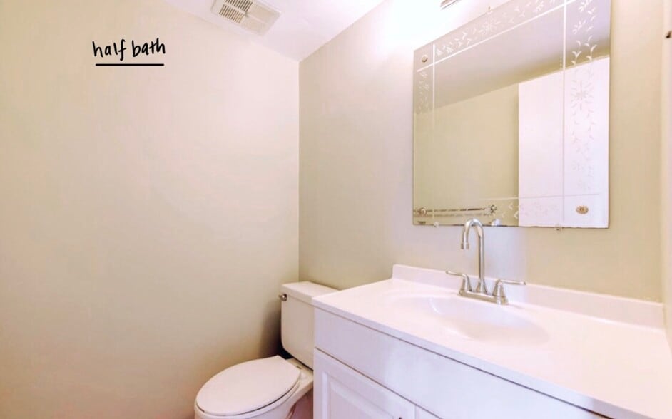 Shared half bath on the main level. - 4767 Kandel Ct