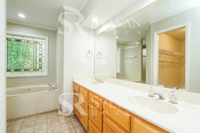 Building Photo - The living is easy in this 4 bedroom, 2.5 ...