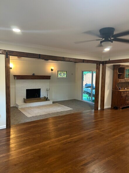 Den with wood burning fireplace - 52 Hammond Rd