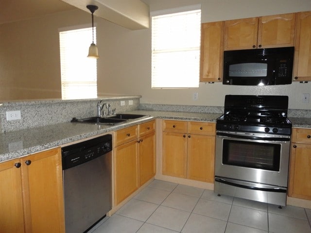 Building Photo - 8340 Spruce Meadows Ave