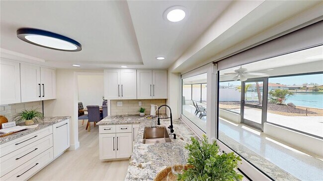 Building Photo - 6380 3rd Palm Point