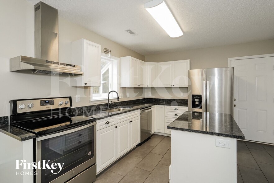 Building Photo - 6350 River Crest Dr