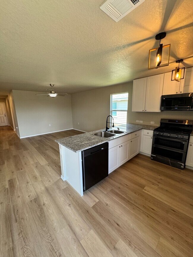 Building Photo - A Must-See Move-In Ready Home with Solar P...