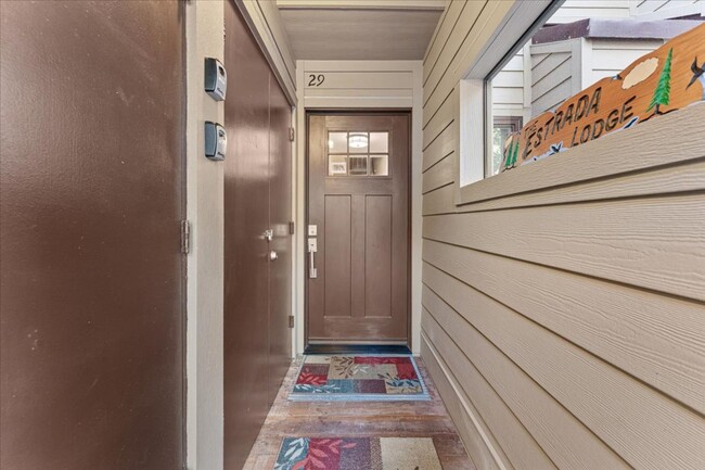 Building Photo - SKI LEASE:  Updated Townhome in Wooded, Central North Lake Location!