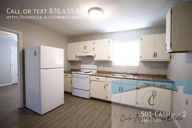 Building Photo - First month move in special $450!!  2-bed,...