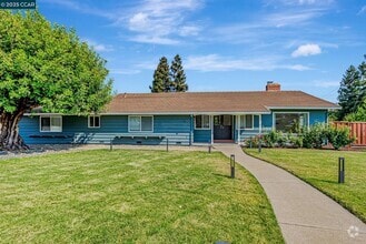 Building Photo - 5891 Caulfield Dr