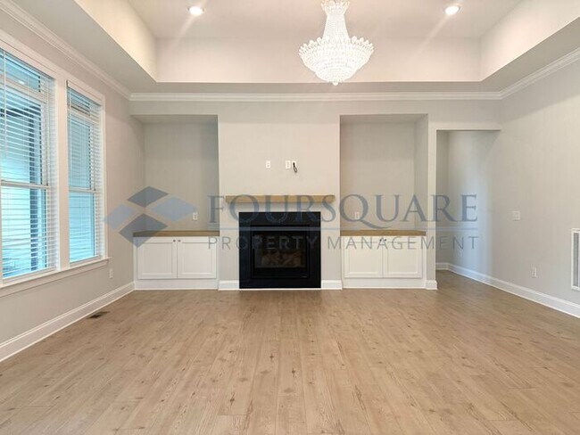 Building Photo - Elegant 4-Bed / 3.5-Bath Home with Main-Level Primary Suite, Quartz Kitchen & 3-Car Garage – In H...